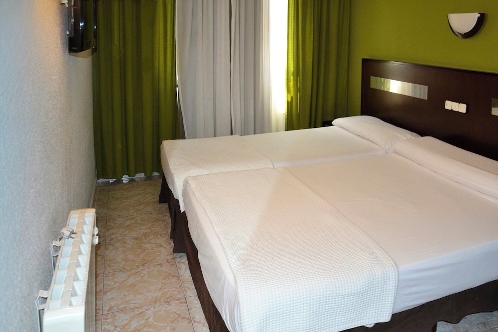 Habitación Triple del hotel Las Estrellas. Foto 2
