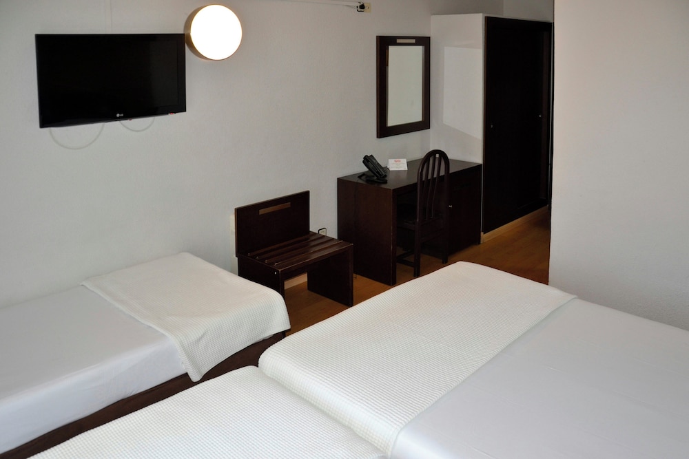 Habitación Cuádruple Familiar del hotel Las Estrellas. Foto 2
