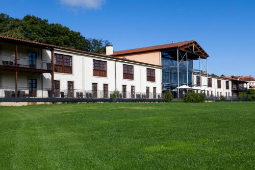 Habitación Doble Deluxe con terraza del hotel Oca Vila de Allariz. Foto 3