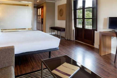 Habitación Doble Deluxe con terraza del hotel Oca Vila de Allariz. Foto 5