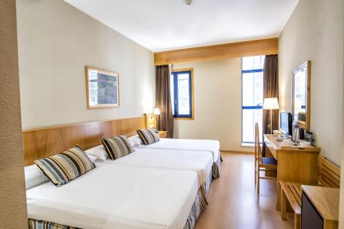 Habitación Triple del hotel Alda Castelao