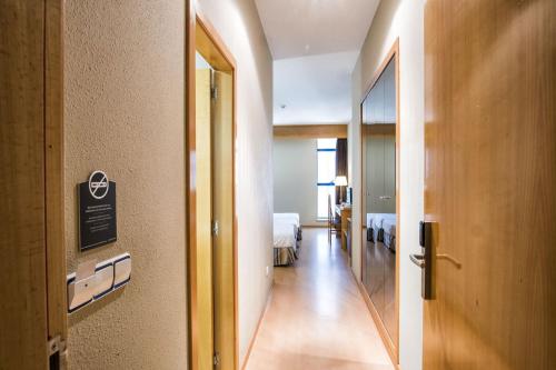 Habitación Triple del hotel Alda Castelao. Foto 8