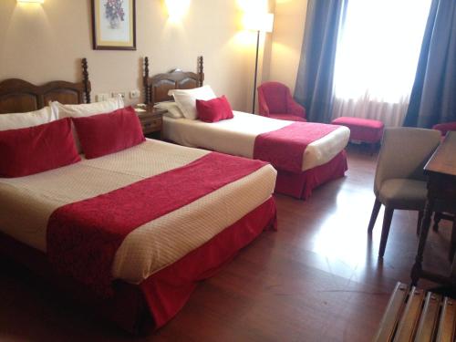 Habitación Doble con Cama supletoria del hotel Pazo o Rial. Foto 1