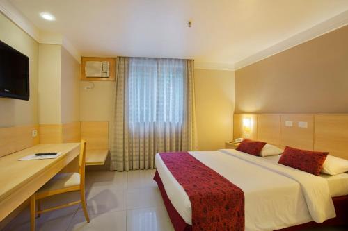 Habitación Doble Estándar del hotel Atlantico Copacabana. Foto 6