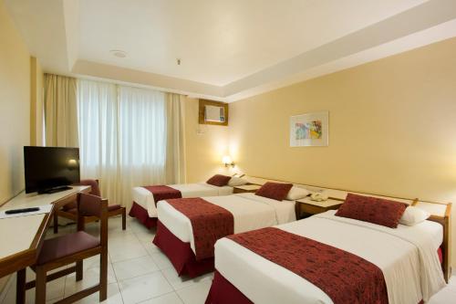 Habitación Triple Estándar del hotel Atlantico Copacabana. Foto 3