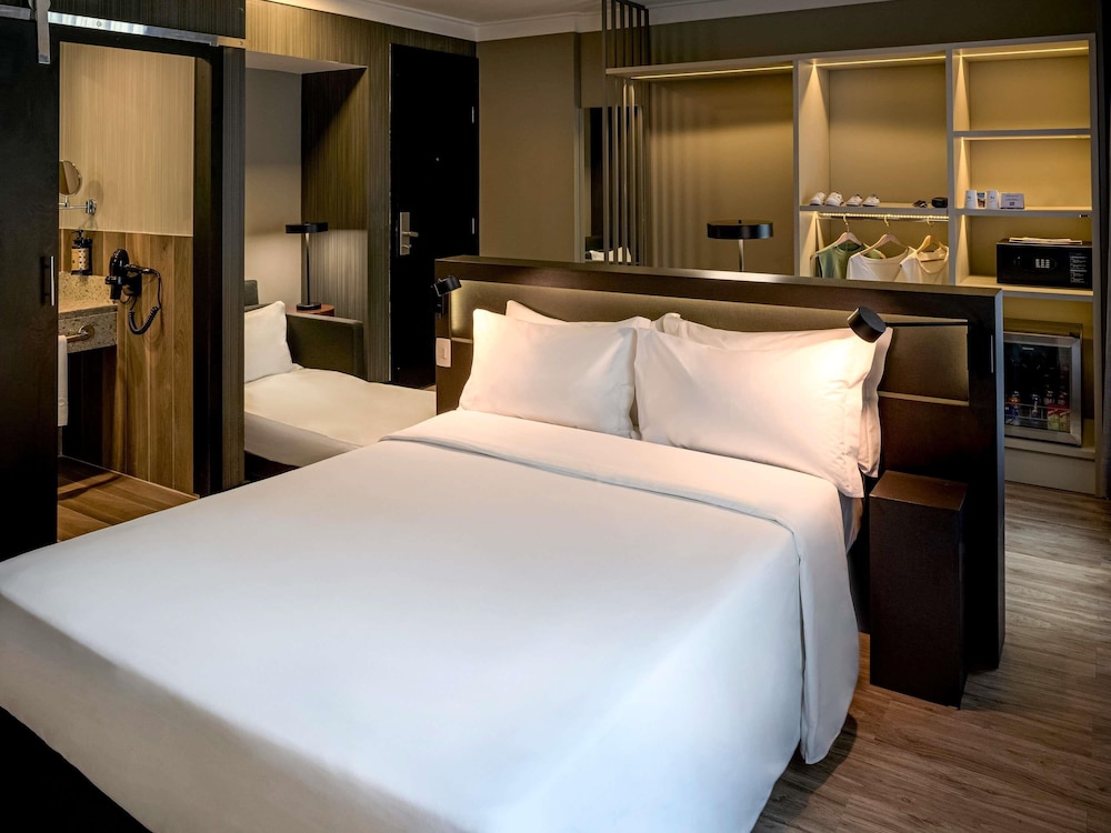 Habitación Superior con cama doble y sofá cama del hotel Novotel Sp Jardins. Foto 4