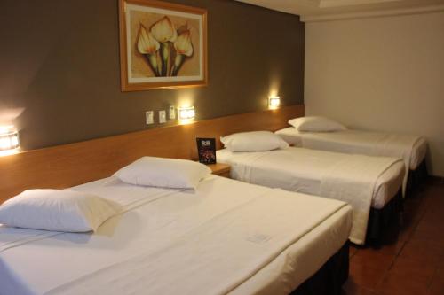 Habitación cuádruple del hotel Del Rey Quality. Foto 1