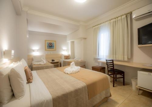Habitación cuádruple del hotel Tarobá
