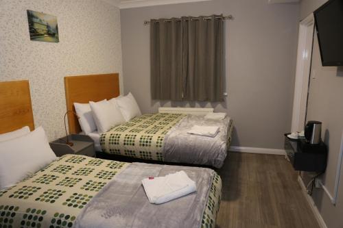 Habitación Doble Estándar - 2 camas del hotel Elstree Inn. Foto 2