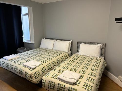 Habitación Triple con baño compartido del hotel Elstree Inn. Foto 9