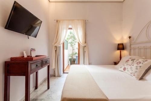 Habitación Doble Estándar del hotel La Casa Del Maestro. Foto 7
