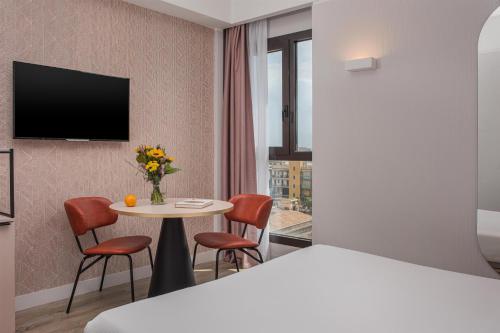 Habitación Individual Superior del hotel Nh Catania Centro. Foto 4