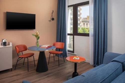 Suite Junior con terraza del hotel Nh Catania Centro. Foto 8