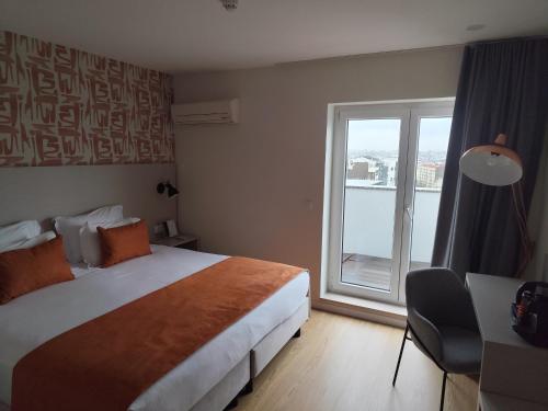 Habitación Doble Superior con balcón del hotel Cliphotel. Foto 7