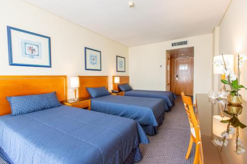 Habitación Triple del hotel Ms Vila Nova. Foto 4