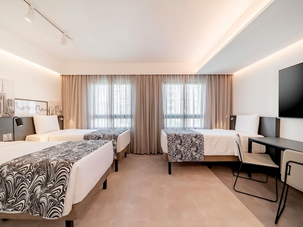 Habitación Superior con 3 camas individuales del hotel Mercure Sao Paulo Pinheiros