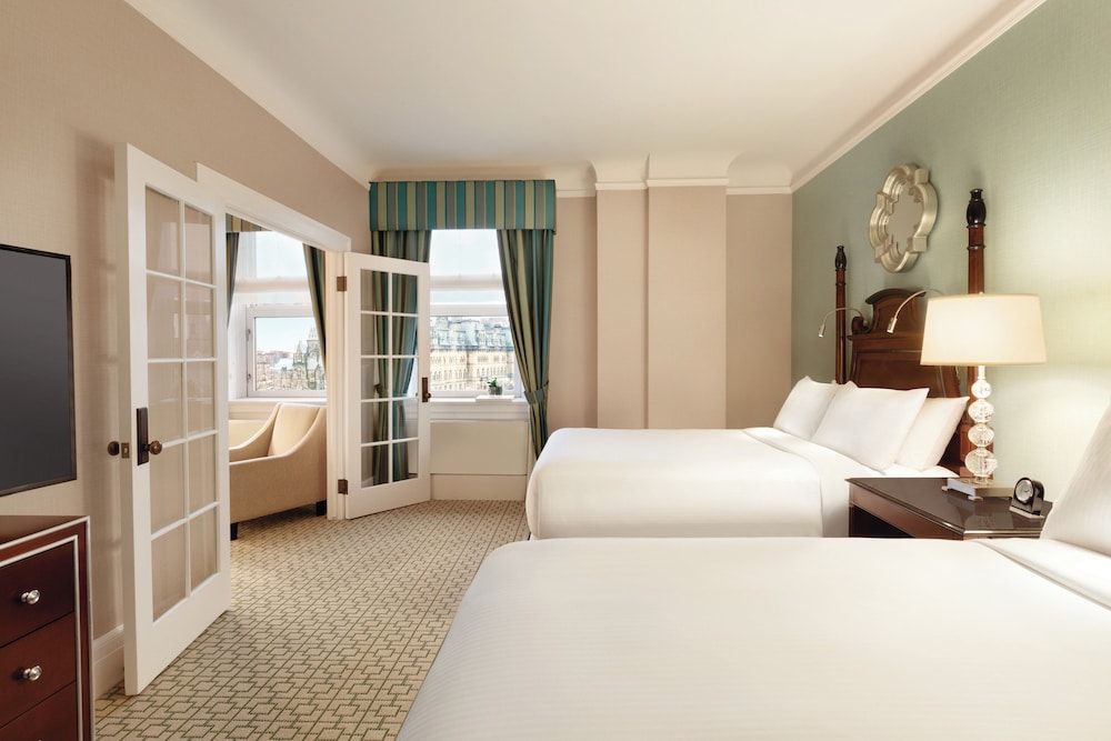 Suite, 1 cama de matrimonio, no fumadores, en esquina del hotel Fairmont Chateau Laurier. Foto 2