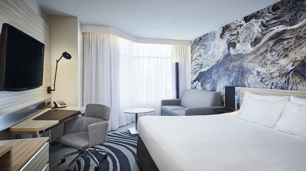 Habitación ejecutiva con 1 cama king size del hotel Novotel Toronto North York. Foto 4