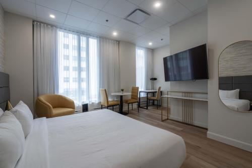 Suite con cama extragrande - No fumadores del hotel Travelodge By Wyndham Montreal Centre