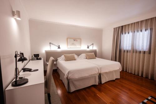 Habitación Doble - 1 o 2 camas del hotel Escuela Santa Brígida. Foto 1