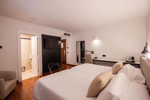 Habitación Doble - 1 o 2 camas del hotel Escuela Santa Brígida. Foto 3