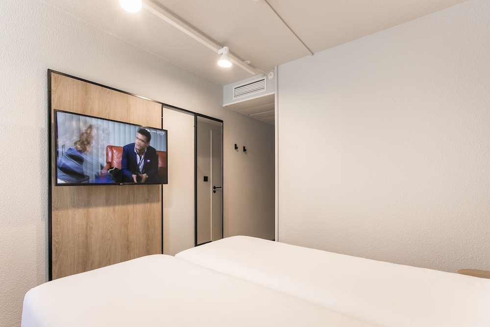 Habitación estándar con 2 camas individuales del hotel Ibis Avignon Sud. Foto 6