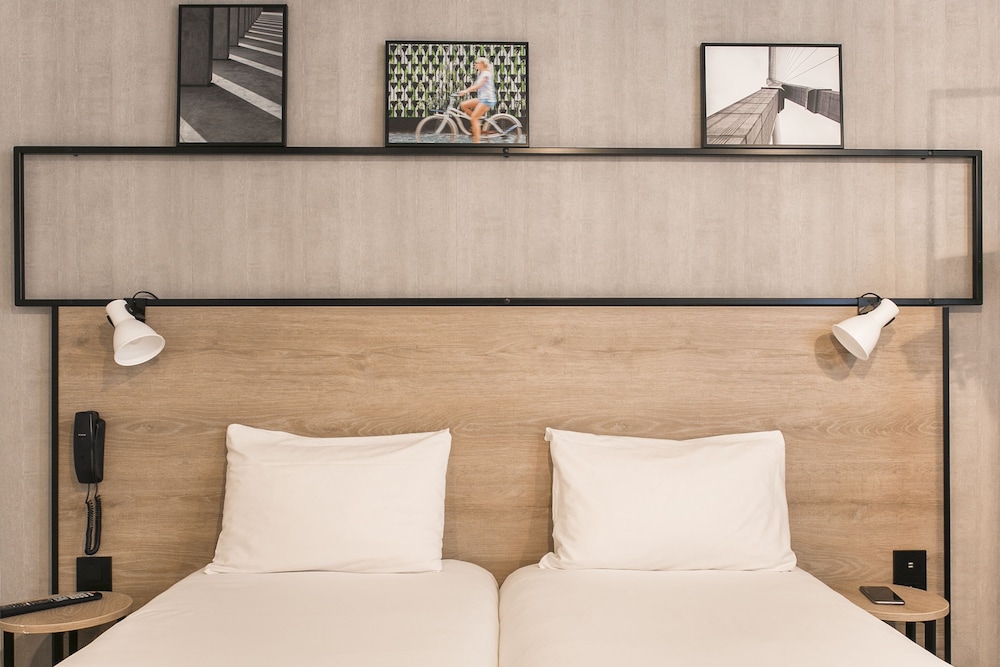 Habitación estándar con 2 camas individuales del hotel Ibis Avignon Sud. Foto 7