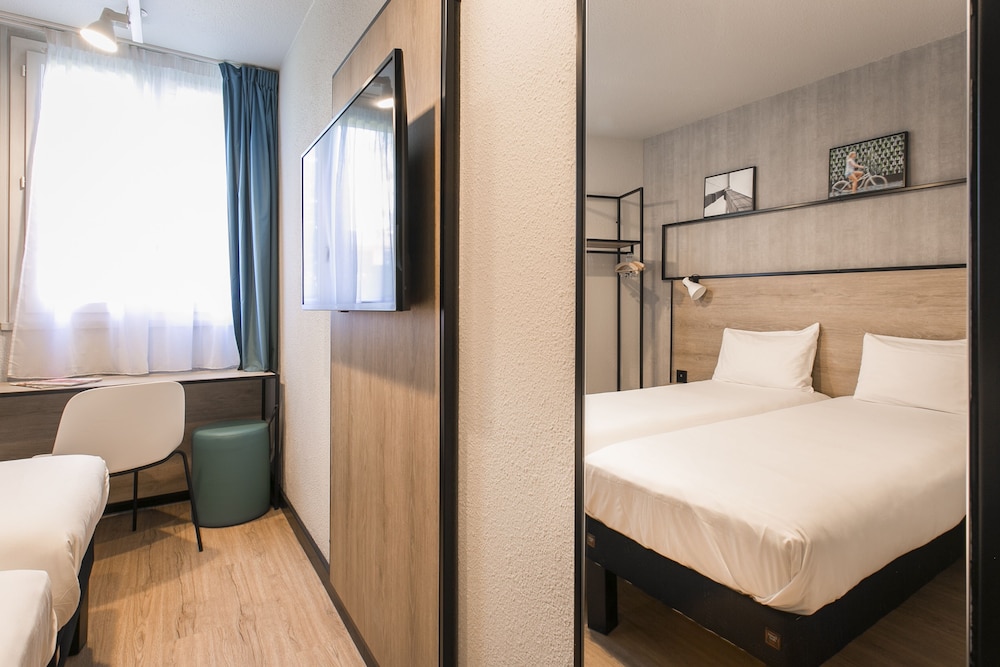 Habitación estándar con 2 camas individuales del hotel Ibis Avignon Sud. Foto 8