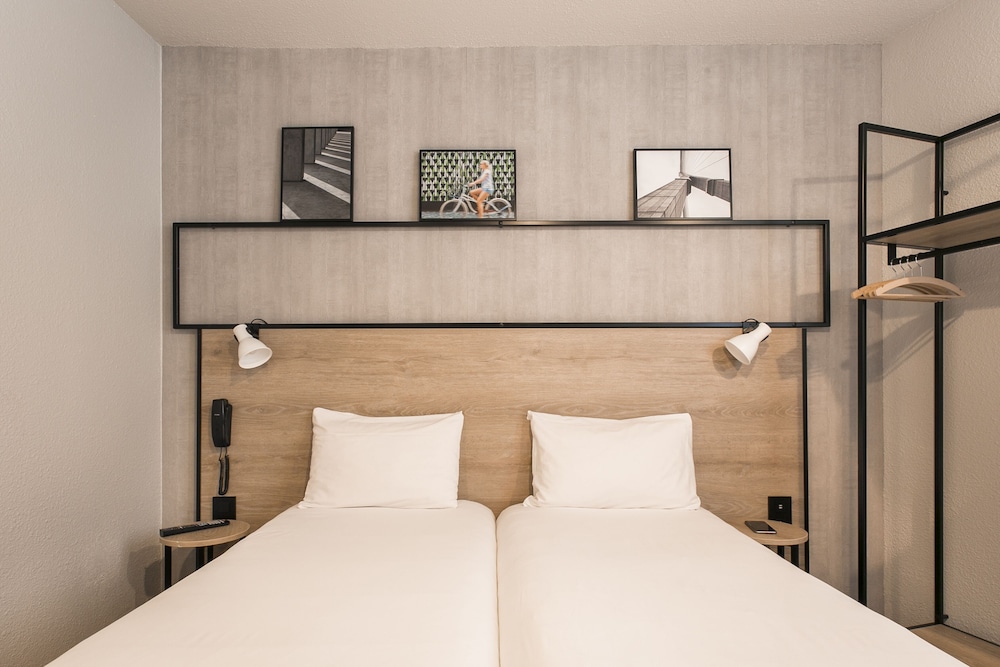 Habitación estándar con 2 camas individuales del hotel Ibis Avignon Sud. Foto 9