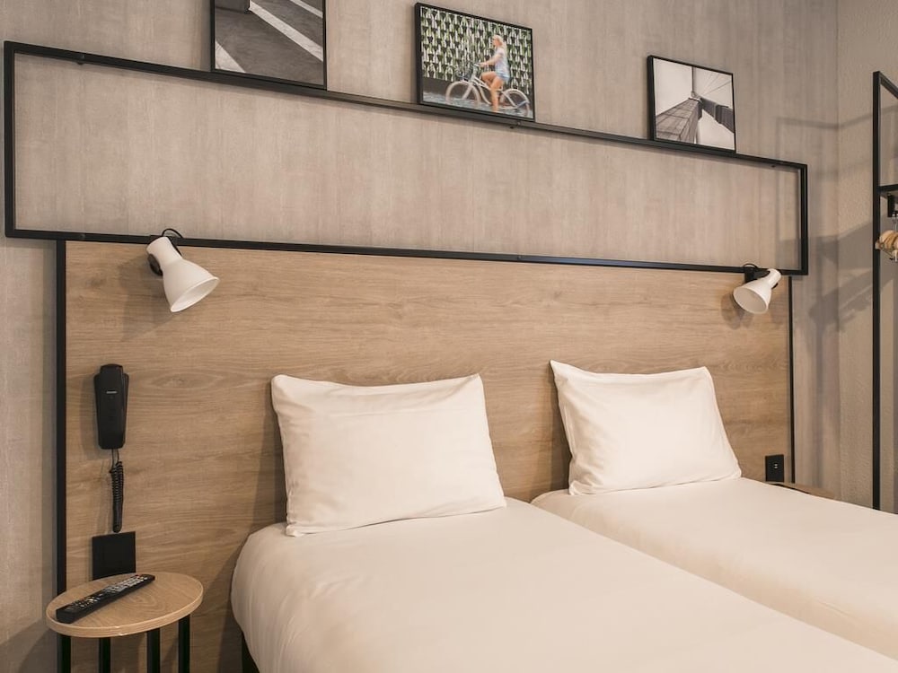 Habitación estándar con 2 camas individuales del hotel Ibis Avignon Sud. Foto 15