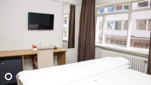 Habitación Doble Estándar - 1 o 2 camas del hotel Center Hotels Klöpp. Foto 5