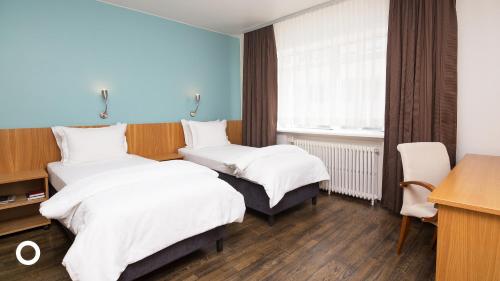 Habitación Doble Superior - 1 o 2 camas del hotel Center Hotels Klöpp. Foto 8