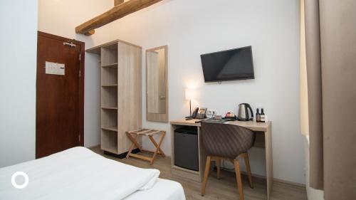 Habitación Individual Estándar del hotel Center Hotels Plaza. Foto 1