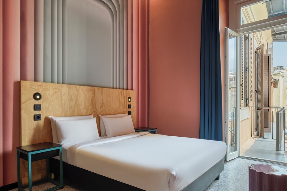 Habitaciones privadas del hotel JO&JOE Roma