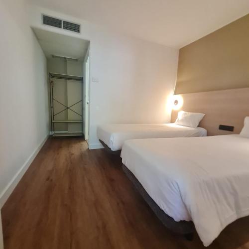 Habitación Doble Superior - 2 camas del hotel Campanile Lisbon South - Setubal. Foto 5
