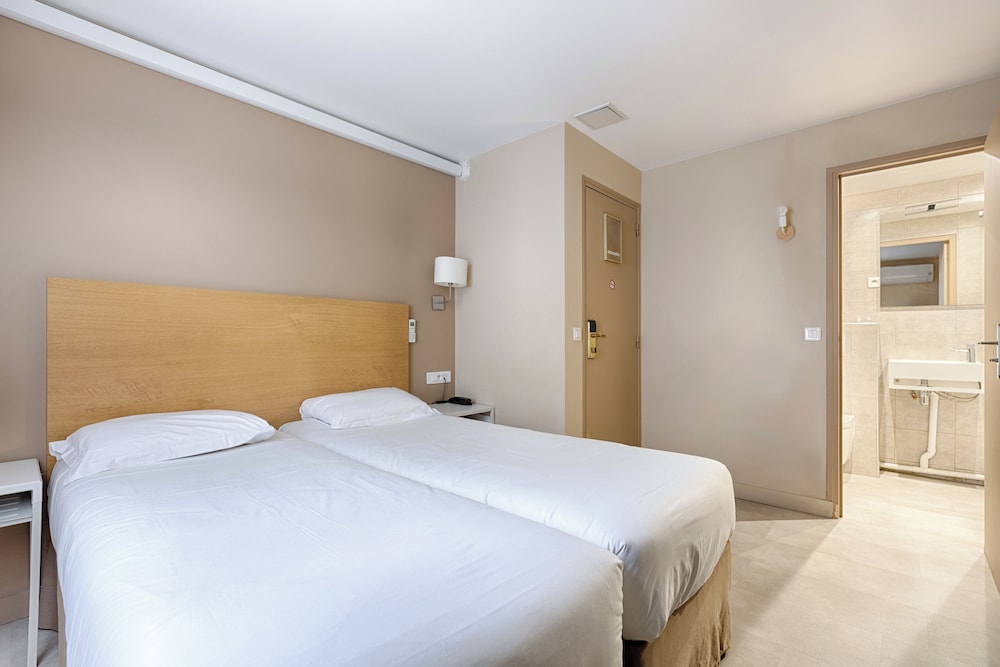 Habitación con 2 camas individuales del hotel Marmotel Etoile