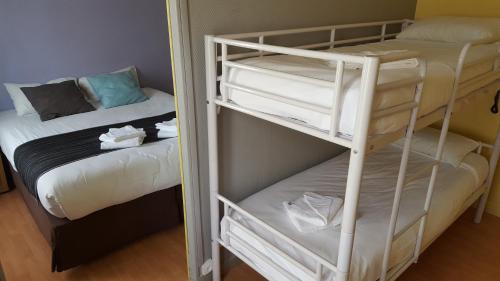 Habitación familiar Cama Litera 1 Cama queen del hotel Le Montclair Montmartre by River - Hostel. Foto 3
