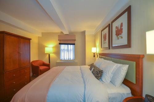 Suite Elite de 1 dormitorio adaptada con cama grande del hotel San Carlos