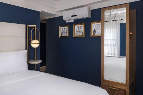 Habitación Estandar del hotel voco The Franklin New York. Foto 1