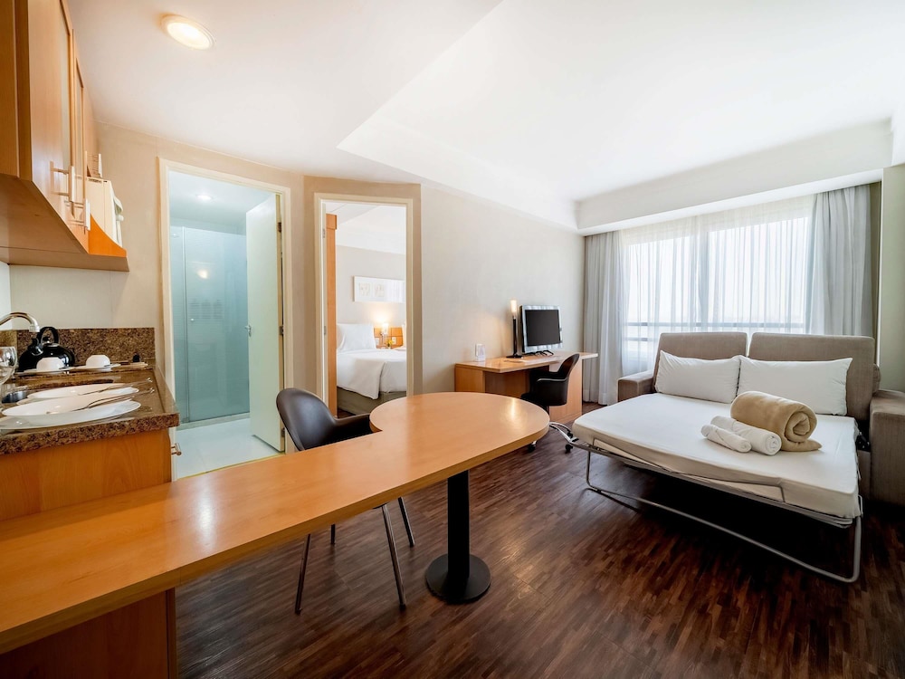 Habitación Estándar con 1 cama doble y 1 sofá - cama del hotel Mercure Guarulhos Aeroporto. Foto 2