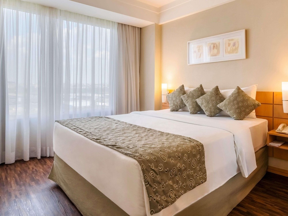 Habitación Superior con 01 cama doble del hotel Mercure Guarulhos Aeroporto. Foto 13