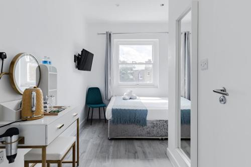 Habitación Doble Deluxe con ducha del hotel Wembar