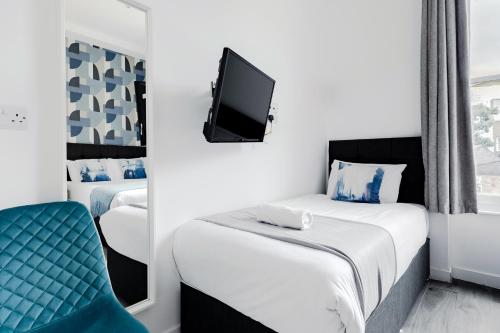 Habitación Triple Estándar del hotel Wembar. Foto 9