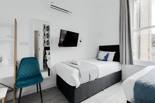 Habitación Triple Estándar del hotel Wembar. Foto 11