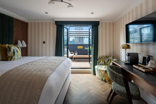 Habitación Doble Deluxe con terraza en la azotea del hotel The Chamberlain