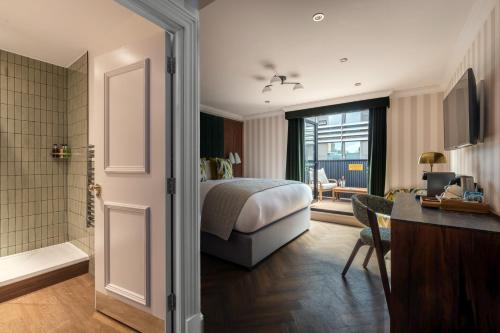 Habitación Doble Deluxe con terraza en la azotea del hotel The Chamberlain. Foto 2