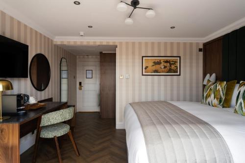 Habitación Doble Deluxe con terraza en la azotea del hotel The Chamberlain. Foto 14