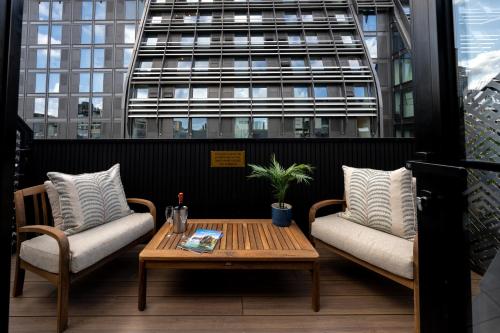 Habitación Doble Deluxe con terraza en la azotea del hotel The Chamberlain. Foto 15