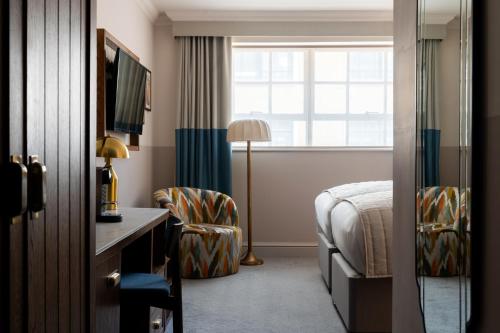 Habitación Doble Deluxe Superior - 1 o 2 camas del hotel The Chamberlain. Foto 10