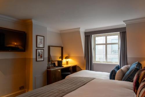 Habitación Doble Deluxe Superior - 1 o 2 camas del hotel The Chamberlain. Foto 14